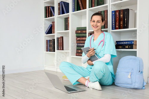 Female medical intern with ...