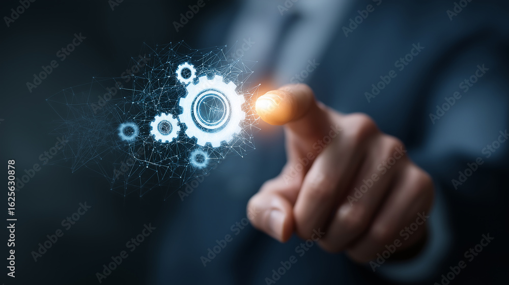 Fototapeta premium Businessman hand finger touch floating digital gear symbolize connection between technology industry.