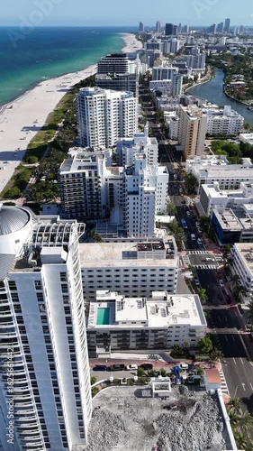 miami beach, miami, florida, usa, aerial, drone, drone shot, aerial view, drone video, beach, shoreline, ocean, coastline, palm trees, turquoise water, skyline, cityscape, beachfront, sunny, clear sky