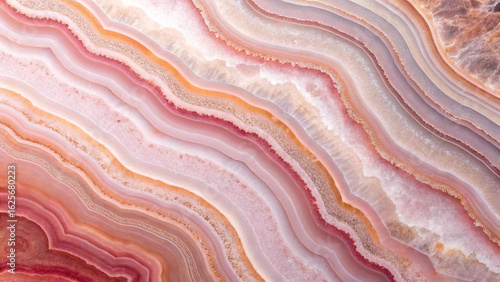 Fototapeta Naklejka Na Ścianę i Meble -  Ultra high resolution close up of a rose pink and white agate surface with flowing layers