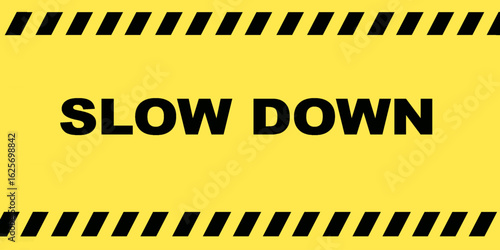 Slow down sign isolated on yellow background.