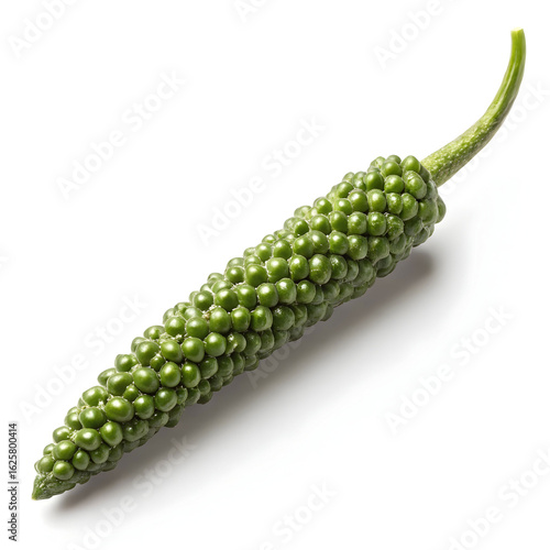 A single dried long pepper (pippali), known for its spicy, earthy flavor and traditional