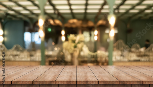 Wallpaper Mural Empty wooden table top with lights bokeh on blur restaurant background.	 Torontodigital.ca