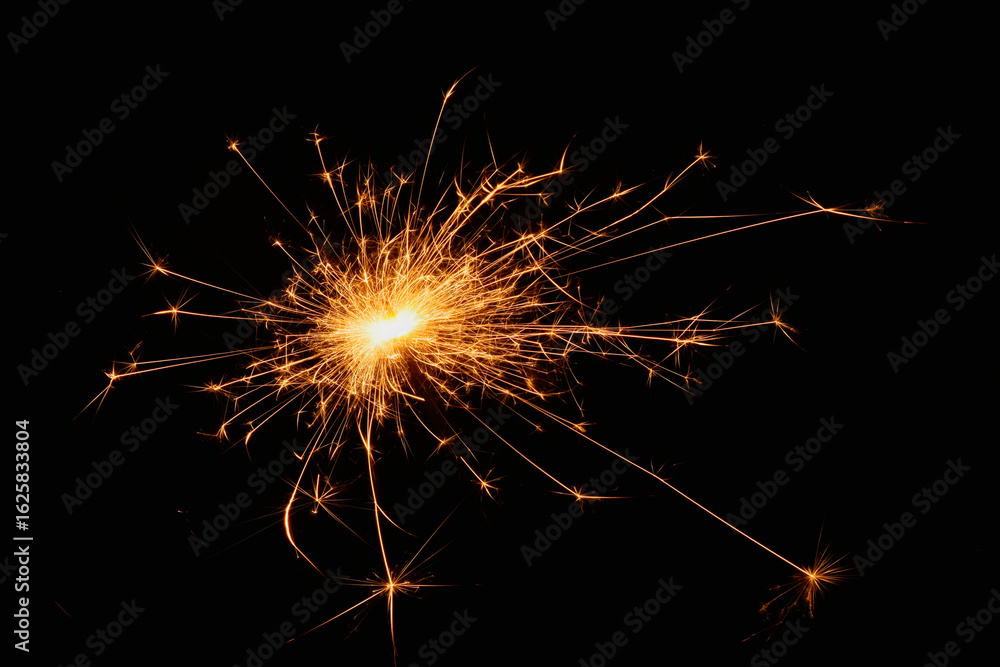 Burning sparks flying. Beautiful flames. Fiery orange glowing flying away particles on black background. Burning sparks flying. Beautiful flames. Fiery orange glowing flying away particles on black background.