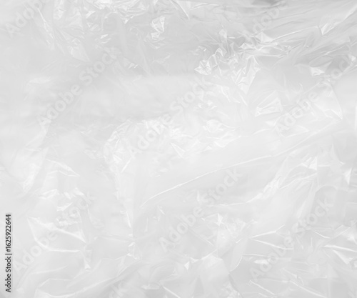 Fotografi Abstract background plastic bag wihte vacuum cling foil wrinkle texture wall cru