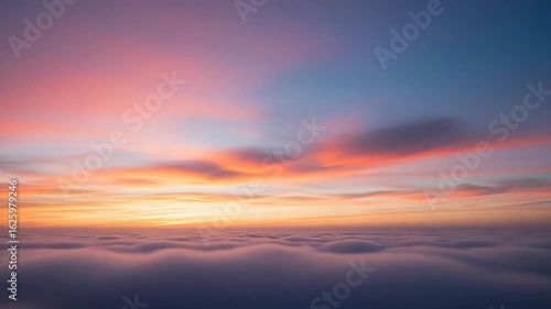 Magnificent Sea of Clouds at Sunset with Golden Light Pink and Blue Sky Aerial View Nature's Breathtaking Dreamy Scenic Landscape