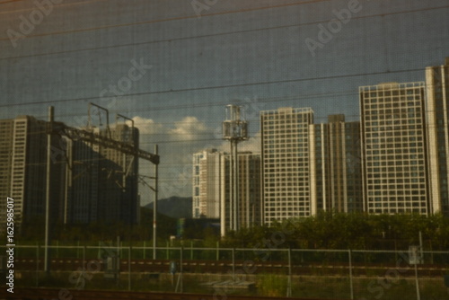  Cityscape View from Train Window