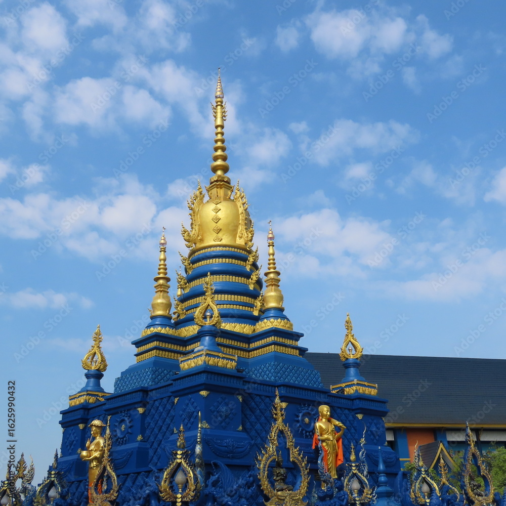 Naklejka premium Wat Rong Suea Ten,Ornate architecture, Buddha and figures in the Blue Temple in Chiang Rai, Thailand, Asia