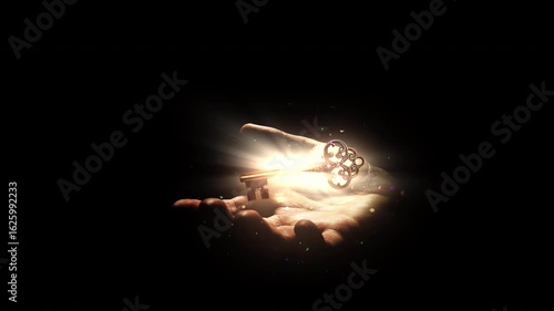 Magic ancient golden key with bright glow from light rays in magic flying dust slowly hovers over human palm isolated on black. Idea of awareness, open mind, awakening. Conceptual 4k slow motion video