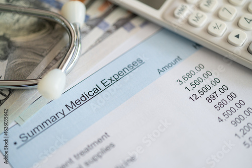 Plan for medical expenses concept. Medical treatment expense on bill statement with calculator and stethoscope.