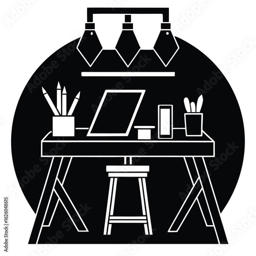 Creative studio desk with art supplies and lighting stool laptop