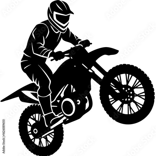 Black motocross rider performing wheelie motorcycle