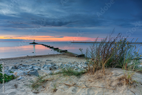 Fototapeta Naklejka Na Ścianę i Meble -  Sunset over the Baltic Sea beach in Gorki Zachodnie, Gdansk. Poland