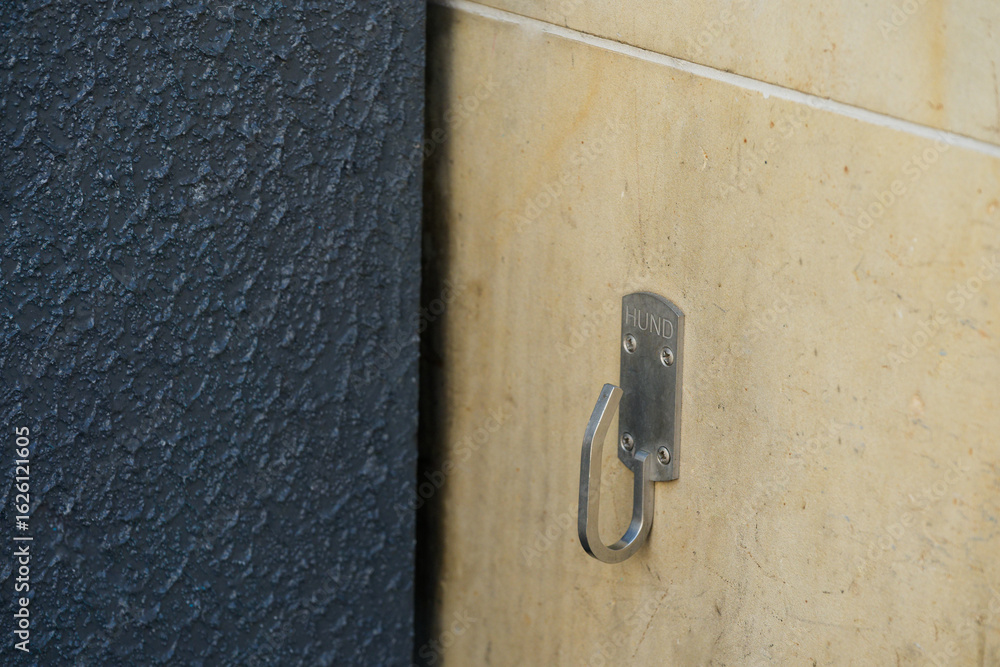 Ταπετσαρία Vintage Yellow Concrete Wall Hook For Dog Leash With Dog Sign in copenhagen