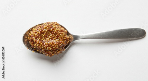Spoonful of Whole Grain Mustard: Tangy Condiment on White Background