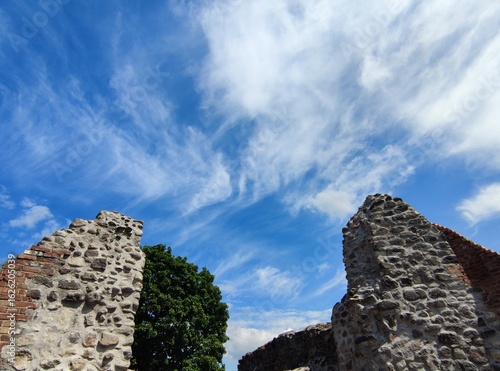 Wallpaper Mural Kisnána Castle Tower in the Mátra Mountains under sunny, veiled sky. Torontodigital.ca