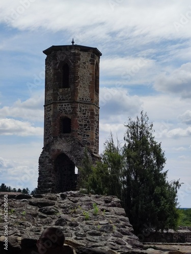 Wallpaper Mural Kisnána Castle Tower in the Mátra Mountains under sunny, veiled sky. Torontodigital.ca