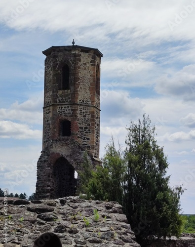 Wallpaper Mural Kisnána Castle Tower in the Mátra Mountains under sunny, veiled sky. Torontodigital.ca