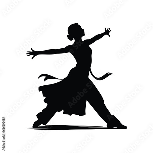 Silhouette of a graceful dancer in a dynamic pose with flowing fabric