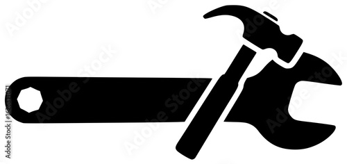 Wrench equipment in a garage with other tools and a hammer