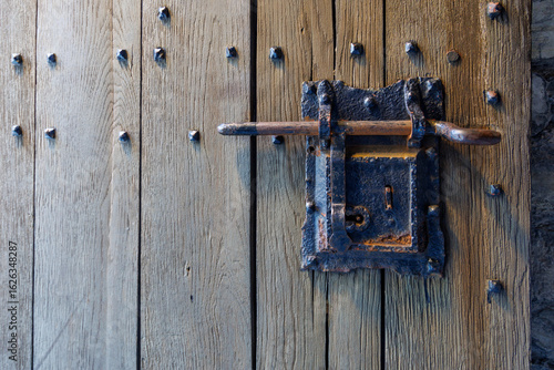 Bolt on a medieval door in Ghent, Belgium
