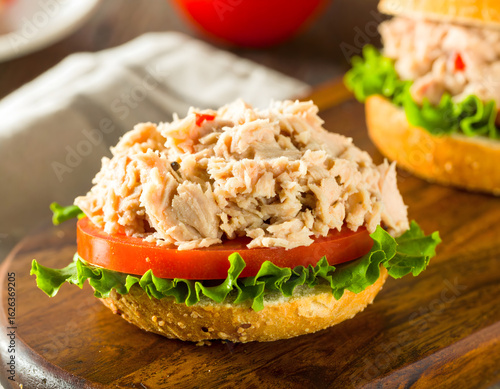 Fresh tuna salad burger with lettuce tomato
