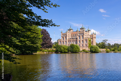 Big Sundby Castle in sunny summer day with beautiful clouds