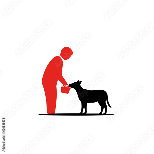 Person feeding dog from bucket. Person carefully pours food into bowl for hungry canine companion.  Kind gesture of feeding stray dog shows compassion and care.