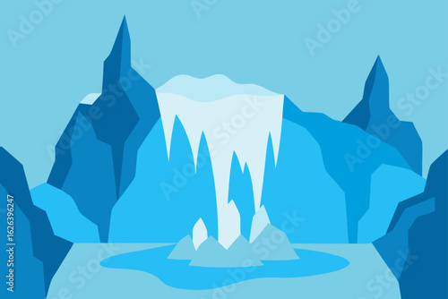 frozen waterfall surrounded by snowy rugged rocks