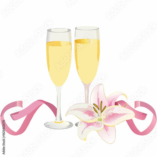 Two champagne flutes filled with bubbly liquid next to a pink lily and ribbon