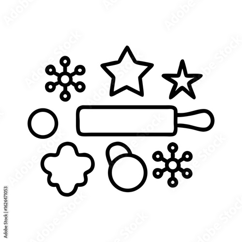 Baking tools and cookie cutters for holiday preparations  