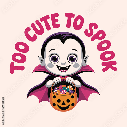Adorable baby vampire holding a halloween candy bucket