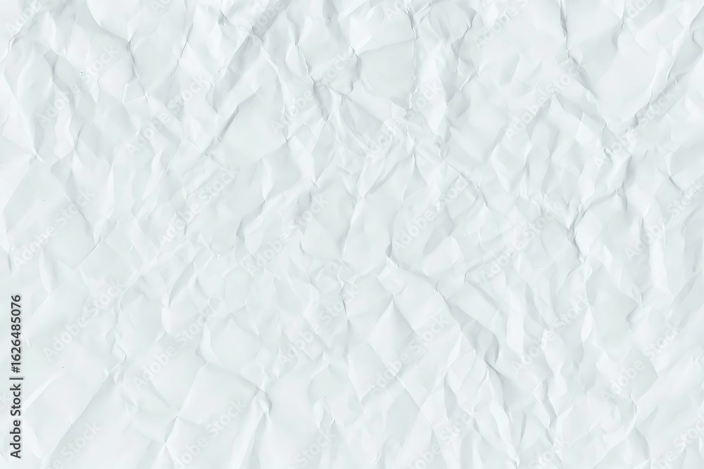 Fototapeta premium Close up texture of light blue wrinkled paper with subtle shadows and highlights