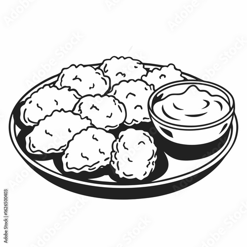 Plate of chicken nuggets with dipping sauce in black and white  