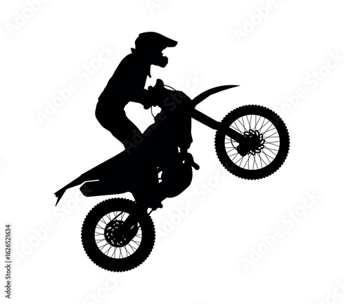 Silhouette of a Motocross Rider Jumping in the Air