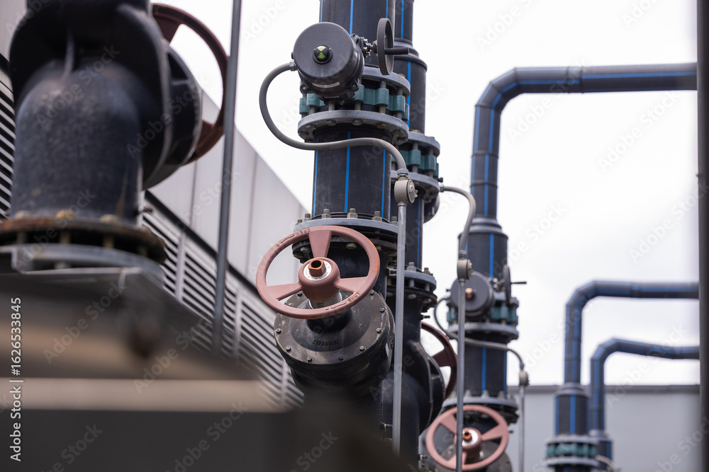 Obraz premium Water is Life for African Children. steel water piping structure in nature. Steel long pipes in crude oil factory. Natural gas pipeline.