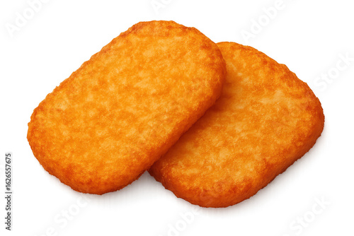 Two golden hash browns resting on a transparent background