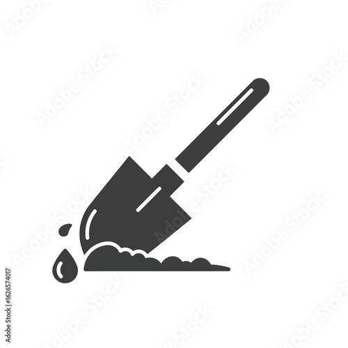 Vector art of a black and white icon of a shovel digging into the ground, with a drop of water, symbolizing gardening and manual labor