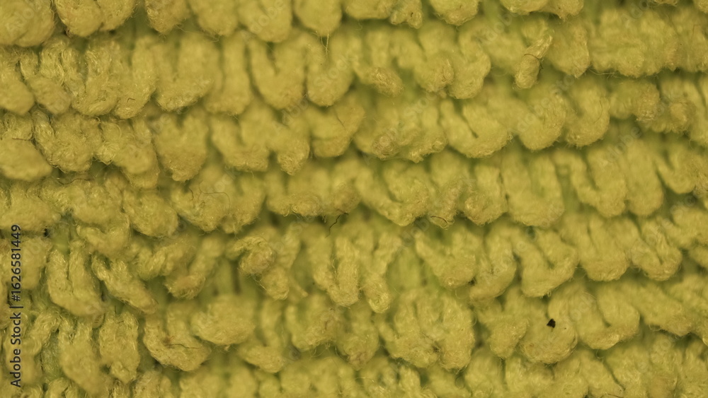 Obraz premium Macro shot detail image of a green wool sweater