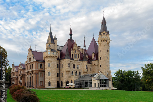 Moszna Castle with an adjoining hothouse in Poland
