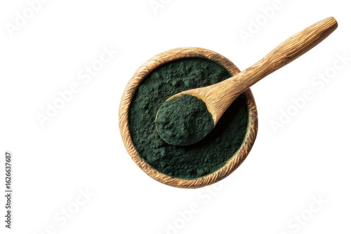 Dark green powder in wooden bowl, wooden spoon