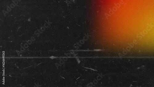 Light leak bleeds across a dark, grunge canvas, accented by film grain and dust for a vintage aesthetic