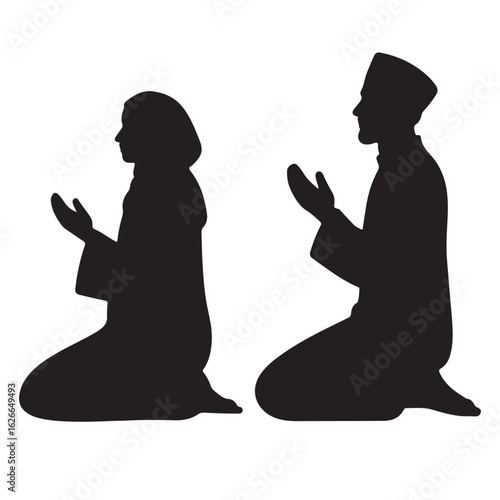 Muslim man and woman praying in silhouette islam