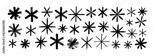 Various crayon drawn asterisks and star shapes. Bold brush drawn asterisks.