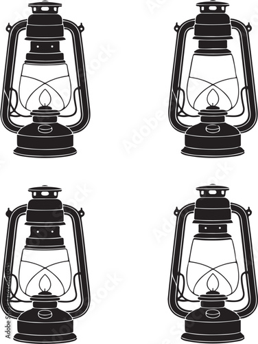 Four black kerosene lanterns with lit flames oil lamp