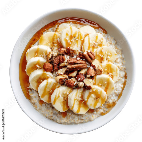 Hot Oatmeal Bowl Topped with Banana Slices, Nuts, and Honey on Transparent Background

