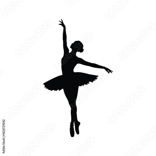 Silhouette of a graceful ballerina performing a ballet pose on pointe shoes