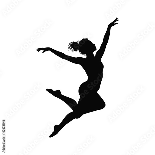 Silhouette of a graceful female dancer leaping in mid air with arms outstretched