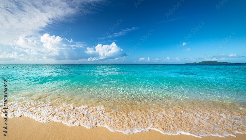 Fototapeta premium crystal clear waves lap against a golden shore at a tropical beach on a sunny day