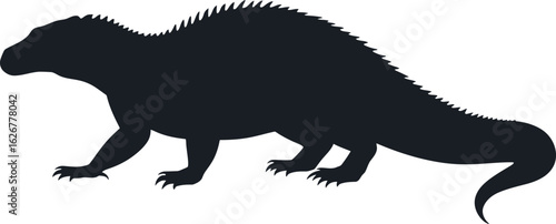 Vector art of silhouette of a monitor lizard walking slowly and carefully as it hunts for prey in the wild natural environment